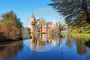 Muskau Palace reflected in the lake in the Lusatia