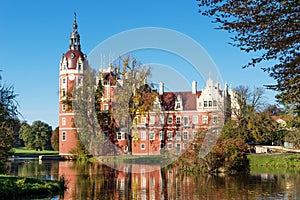 Muskau Palace reflected in the lake in the Lusatia