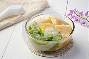 Muskmelon and Chendol In Sweet Coconut Milk And Ice in glass bowl