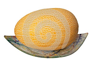 The muskmelon on the glass plate on white background
