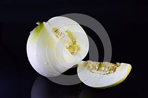 Muskmelon/white melon isolated on black background