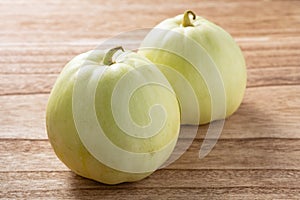 muskmelons on a wood background