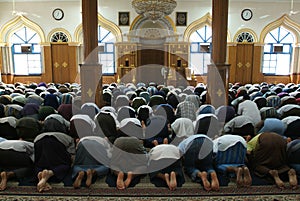 Muslem prayer at a mosque of Yangon photo