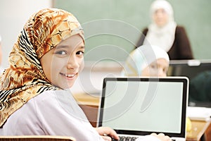 Children at school classroom photo