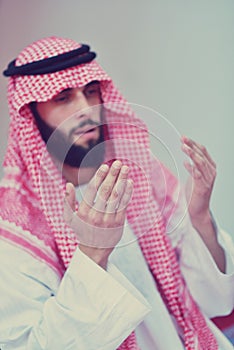 Muslim Arabic man praying