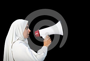 Muslim Arabic woman with hijab shouting through megaphone calling for Hajj