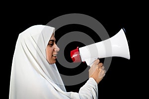 Muslim Arabic woman with hijab shouting through megaphone calling for Hajj