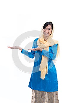 Muslim asian woman isolated presenting