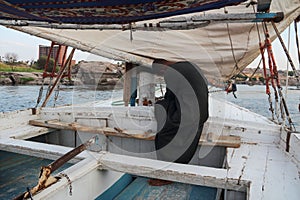 Muslim boatman of the Nile in luxor, Egypt at sunset