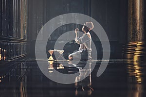 Muslim boy having worship and praying for fasting and Eid