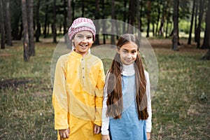 Muslim boy in kufiya smiling at