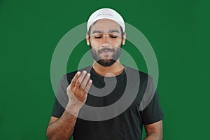 muslim boy man praying on Green screen background