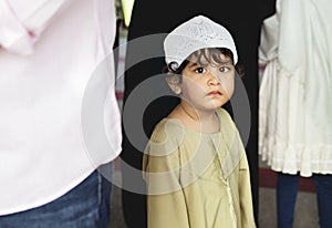 Muslim boy at the mosque with his family photo