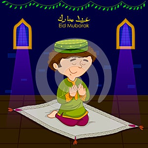 Muslim boy offering namaaz on Eid for Ramadan background