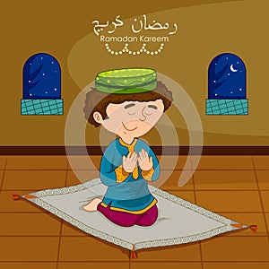 Muslim boy offering namaaz on Eid for Ramadan background photo