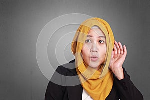 Muslim Businesswoman Hearing Gesture