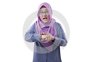Muslim Businesswoman Late and Worried Looking at Wrist Watch