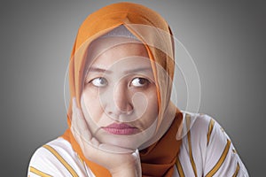 Muslim Businesswoman Thinking Something, Hand Under Chin