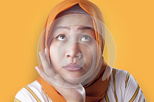 Muslim Businesswoman Thinking Something, Hand Under Chin