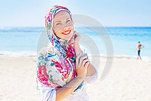 Muslim caucasian (russian) woman wearing red dress