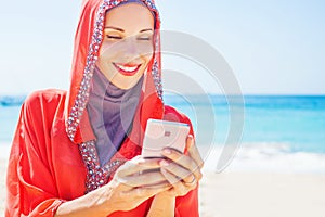 Muslim caucasian (russian) woman wearing red dress