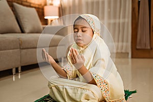 Muslim child pray to god
