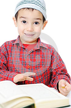 Muslim Child Reading Qur'an