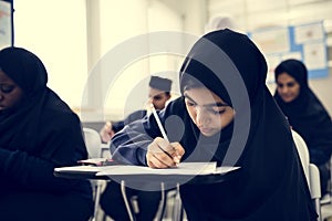 Muslim children studying in classroom photo
