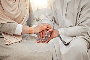 Muslim couple, hands together for support and empathy with care and love, solidarity and trust in relationship. Help