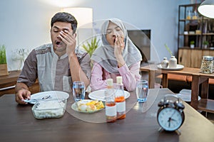 muslim couple having breakfast or sahur in morning