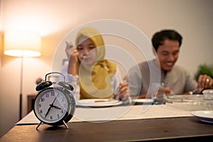 muslim couple having breakfast or sahur photo