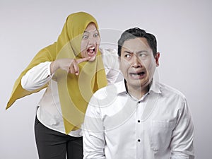 Muslim Couple Having Conflict, Husband Afraid to His Wife Concept