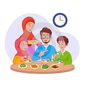 Muslim Family eating sahur or eat early morning before fasting day photo