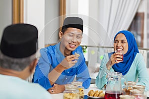 Muslim family feasting during the Eid celebration