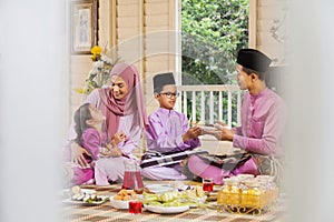 Muslim family feasting during the Eid celebration