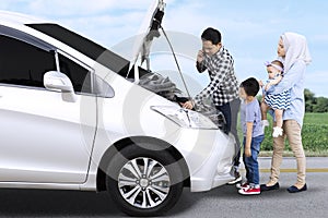 Muslim family having problem with broken car