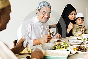 Muslim family having a Ramadan feast photo
