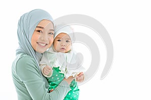 Muslim family or Islam mother with baby standing on white background space for text