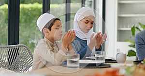 Muslim family, praying or dinner at table for Ramadan, Eid Mubarak or Iftar at home. Food, mother and father with child