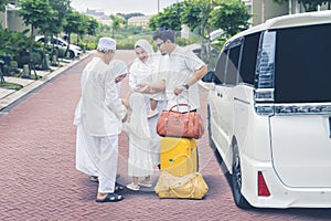 Muslim family saying goodbye to grandparents