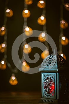 The Muslim feast of the holy month of Ramadan Kareem. Beautiful background with a shining lantern Fanus.