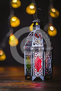 The Muslim feast of the holy month of Ramadan Kareem. Beautiful background with a shining lantern Fanus.