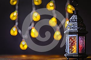 The Muslim feast of the holy month of Ramadan Kareem. Beautiful background with a shining lantern Fanus.