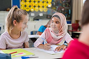 Muslim girl with her classmate