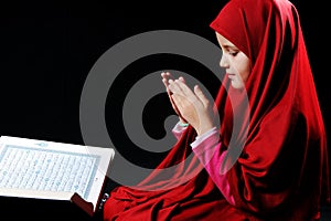 Muslim girl with Holy Koran photo