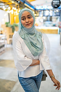 A muslim girl in a mall