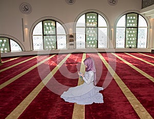 Muslim girl pray in mosque