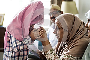 Muslim girl praying respect to mother