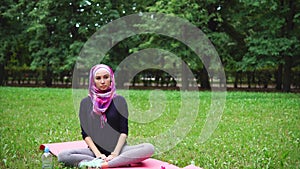 Muslim girl working out in the park
