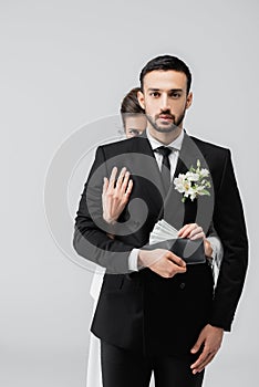 Muslim groom looking at camera while